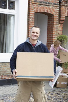 Office removals planning in Finsbury Park with moving boxes and workspace equipment