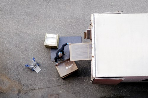 Removal van and moving crew preparing for a flat relocation in Finsbury Park