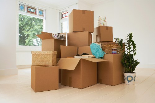 Packed office boxes and equipment ready for relocation