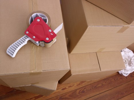 Packed boxes and furniture prepared for a UK move