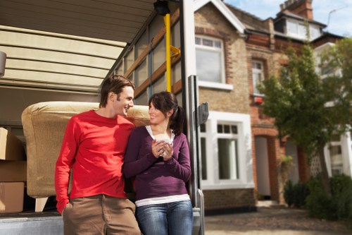Team planning a safe removals route inside a property