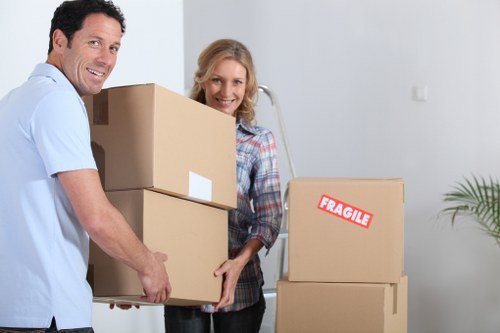 Furniture and boxes being loaded into a removal van for a North London move